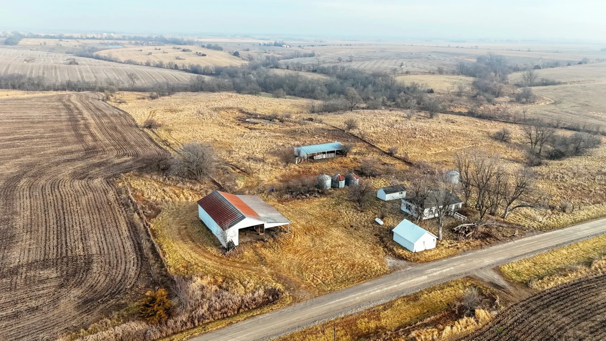 Aerial view of farmland and structures