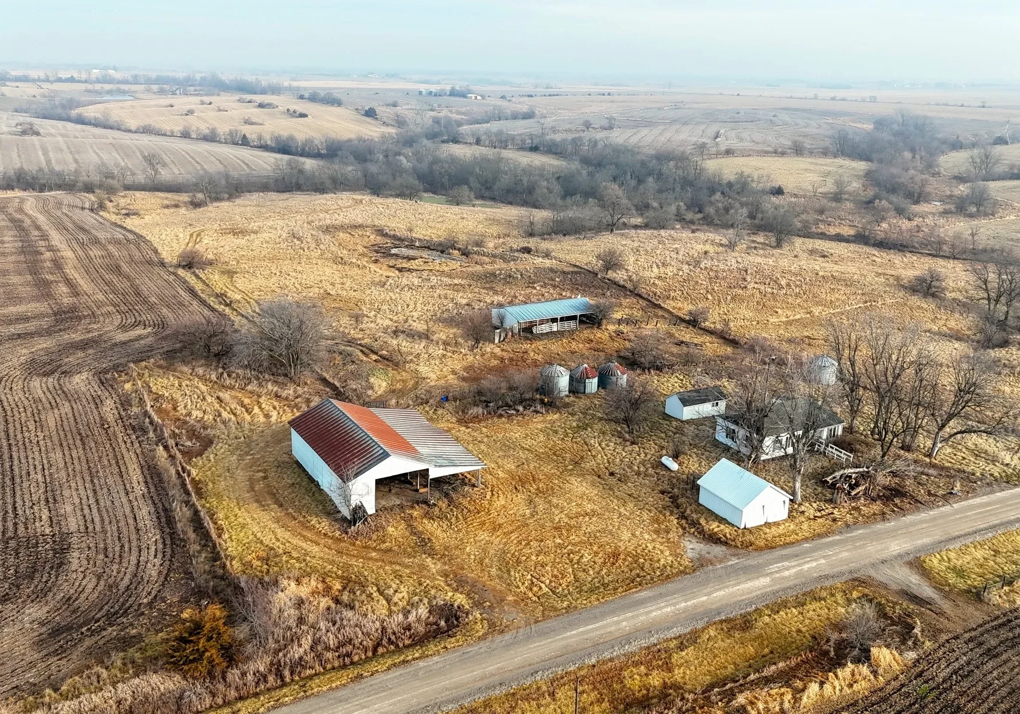 Aerial view of farmland and structures